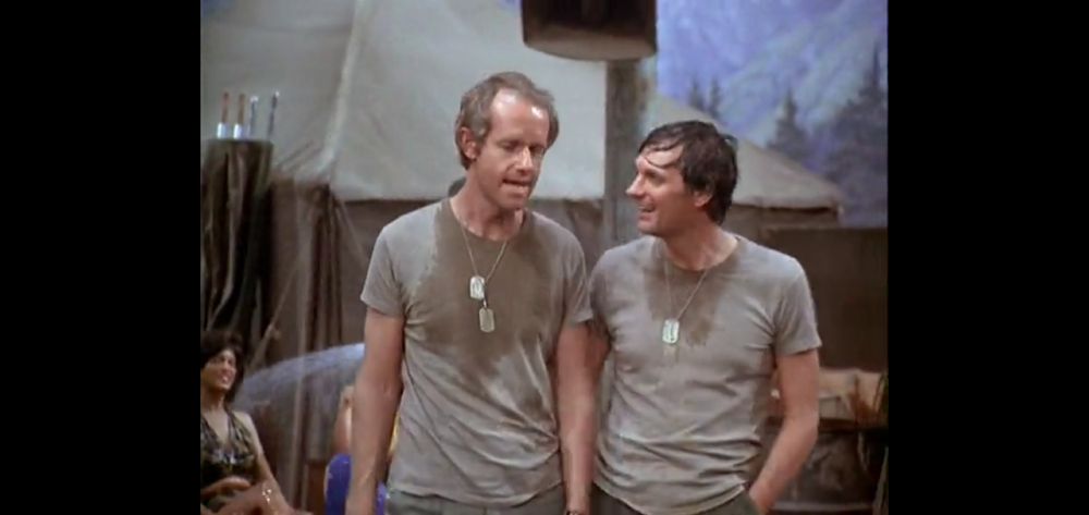 BJ and Hawkeye from MASH in sweaty shirts