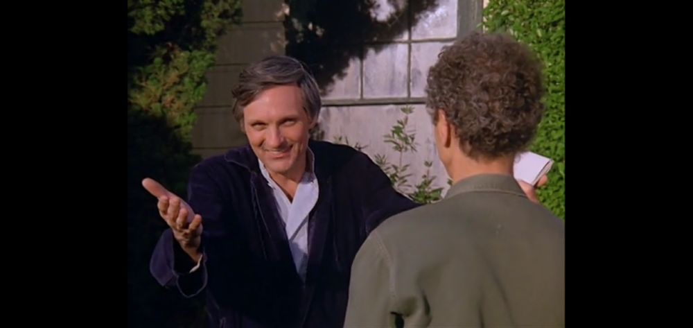 Alan Alda as Hawkeye Pierce smiling into the camera for some reason even though he's speaking to Allan Arbus as Sidney Freedman