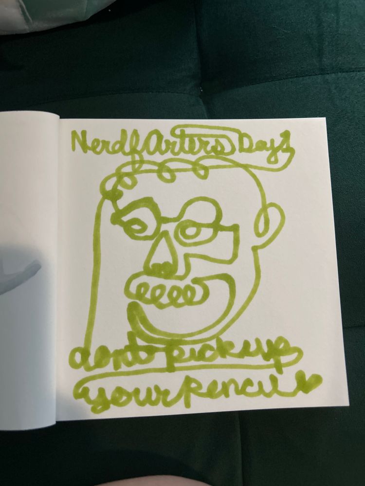 A olive green marker drawing where it’s all one line because you never pick up your pencil. It’s of Pizza John from my memory, I kinda forgot about his hair until after I drew his eyes so he has a very small forehead. And I was trying to fill out the shape of his chin. But it instead looks like he’s screaming like courage the cowardly dog. Also those glasses, are fucked up. 