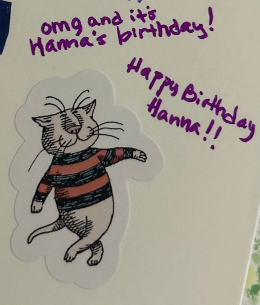A cropped picture of my journal entry that is an Edward Corey illustrated cat in a striped sweater dancing sticker and little hand written notes that say omg it’s Hanna’s birthday happy birthday Hanna!