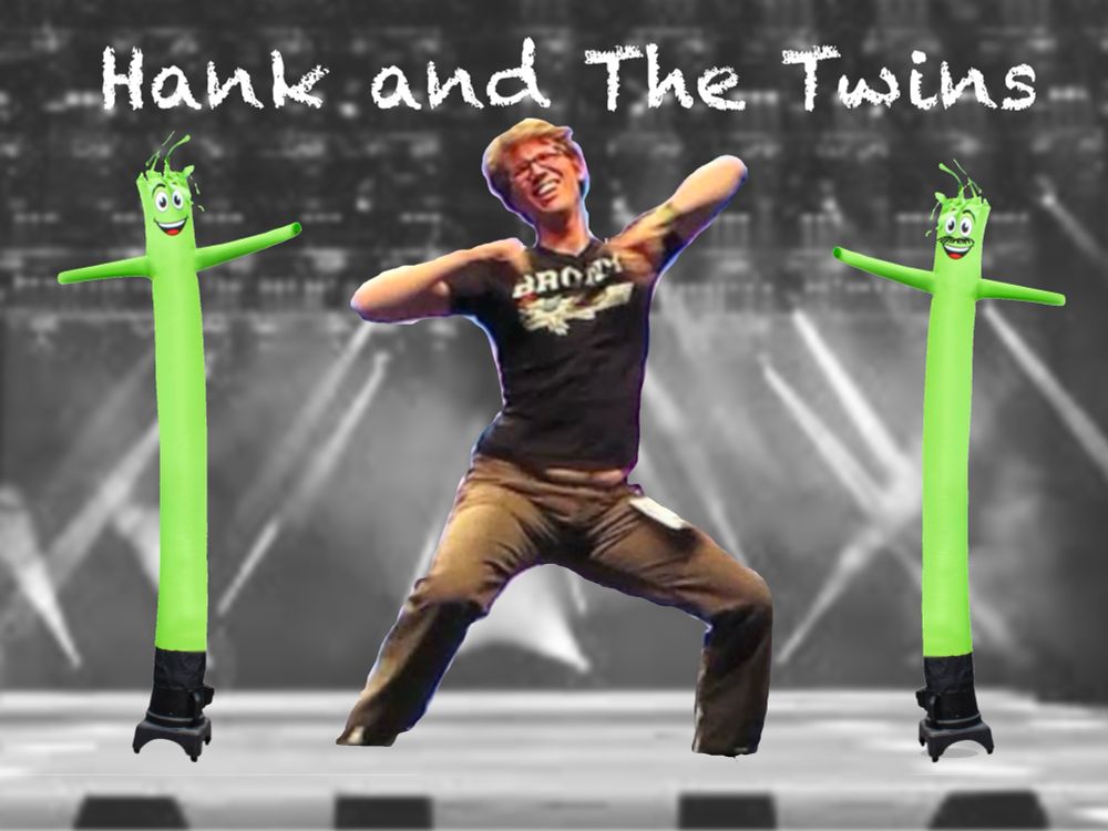 A photoshop of Hank busting a move (photo is probs like 15 years old) superimposed over a stage. Next to Hank on either side are two green silly inflatable tube men. One of them has a mustache. There’s text at the top that says Hank and the Twins