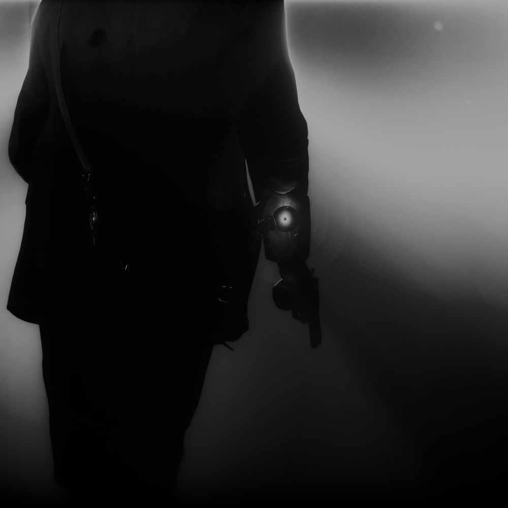 Virtual photography capture from Alan Wake 2. Alan Wake is viewed from behind, only his midsection to his knees is visible along with his right arm which is holding a revolver. A lightbulb on top of the lamp Alan carries in his satchel is gently lit, while a bright light shines from the top left of the image out of view of the camera. The light creates a foggy grey background and a strong umbra caused by the light's positioning to Alan. The image is in the same black and white/grayscale as the first image.
