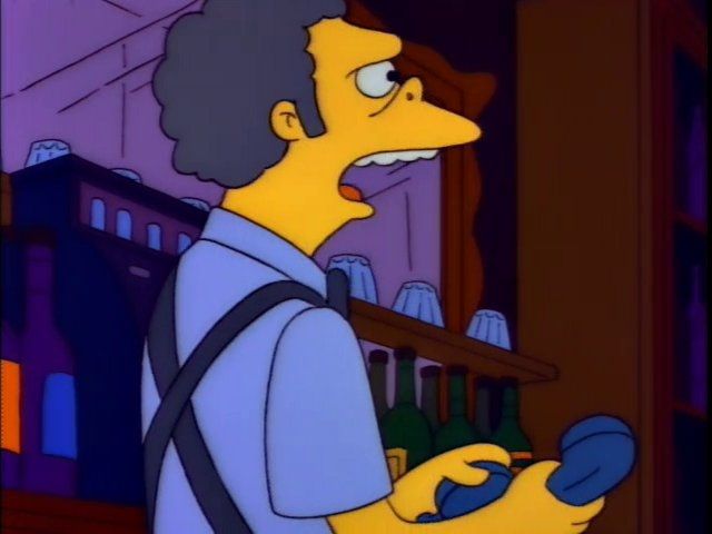 moe holding a phone and yelling 