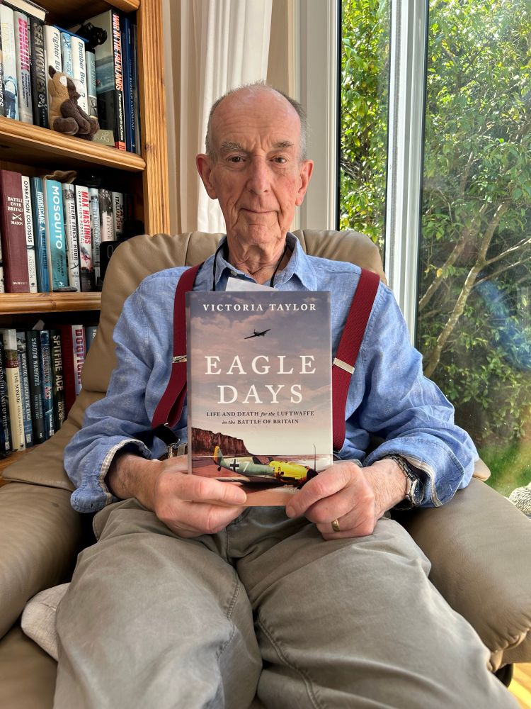 My dad with a copy of Eagle Days by Dr. Victoria Taylor. 