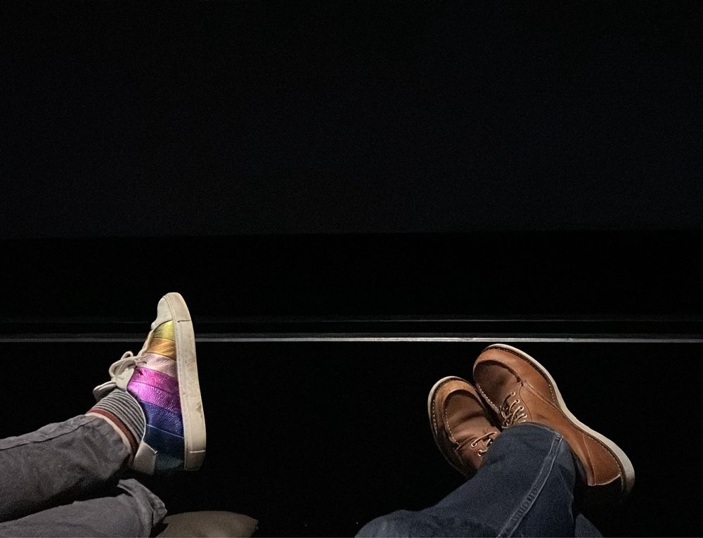 My feet and my wife’s feet in a cinema.