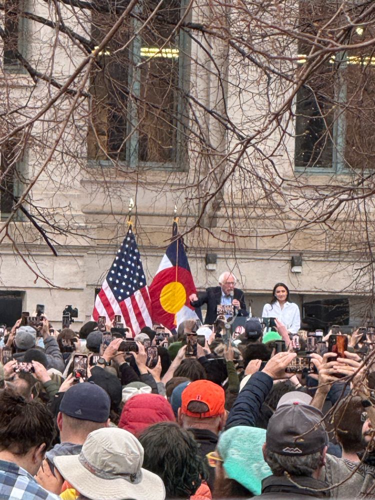 Bernie Sanders and AOC at the capital in Denver CO giving a speech 