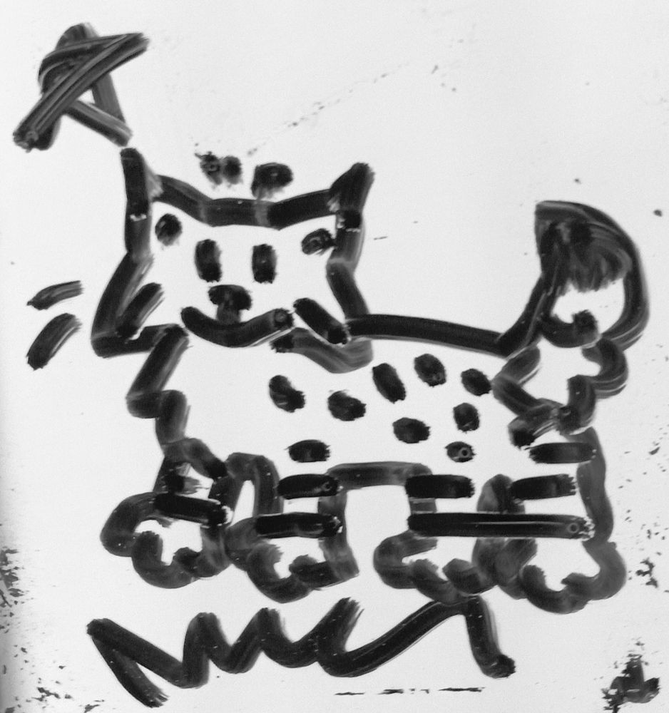 Marker drawing of a bobcat with a smile, grass below it and a star above it