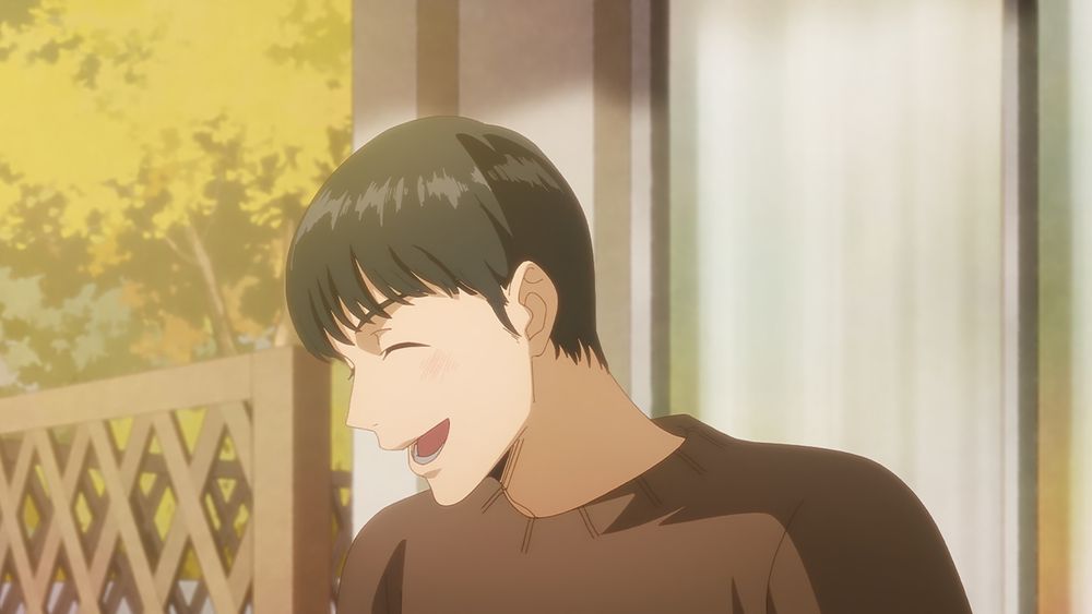 A screencap from the Captivated By You anime. The character Ema has his bangs down is laughing.