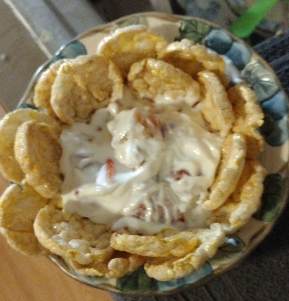 -Greek Yogurt
-Strawberries (or fruit of choice)
-Granola, nuts, etc.. 
Mix together for the 'dip'

-Caramel crisps for the 'chips'