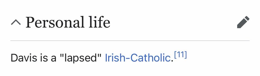 Wiki: Davis is a “lapsed” Irish-Catholic