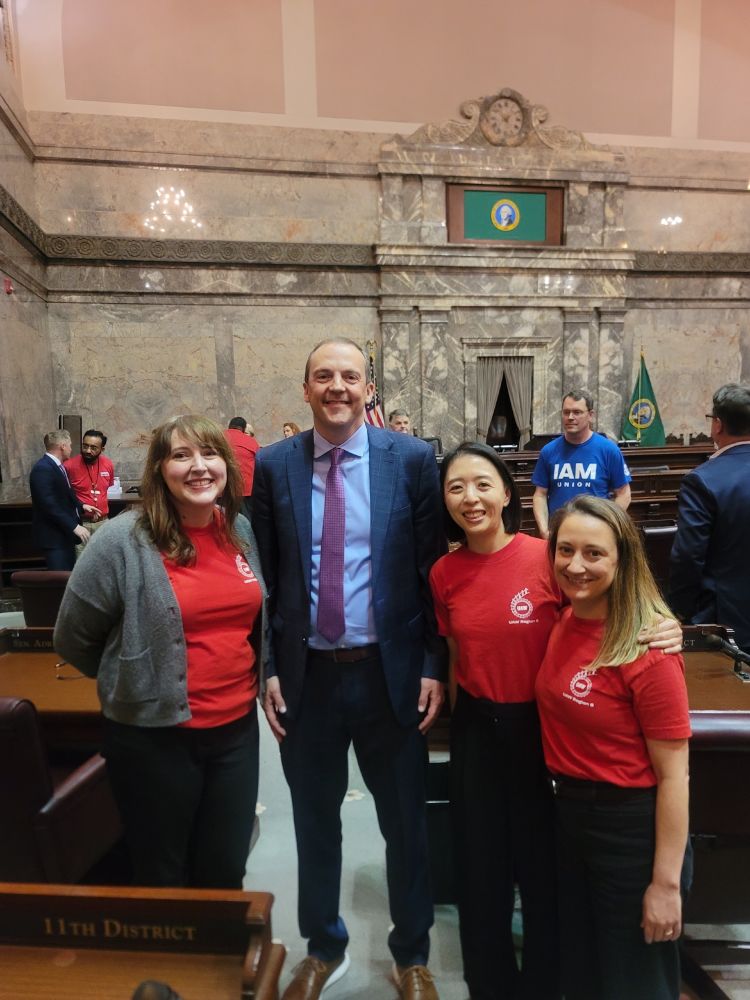 Three UAW members with Senator Riccelli