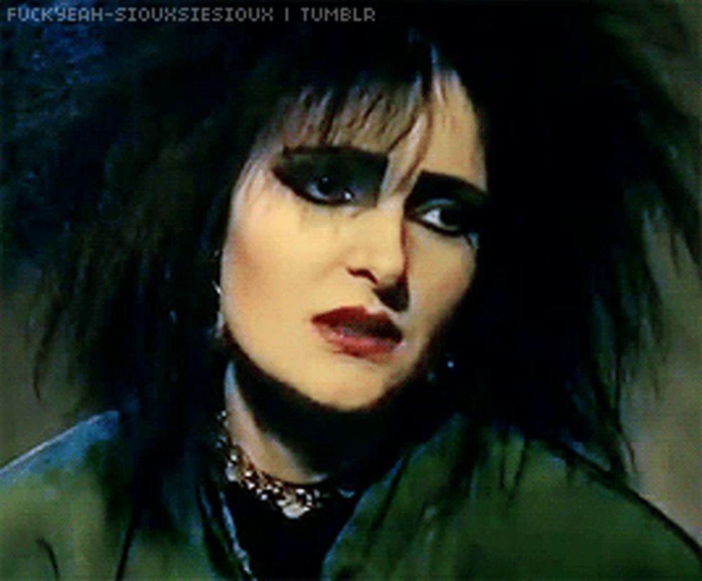 a close up of a woman 's face with the words " fuckyeah-siouxsiesioux i tumblr " on the bottom