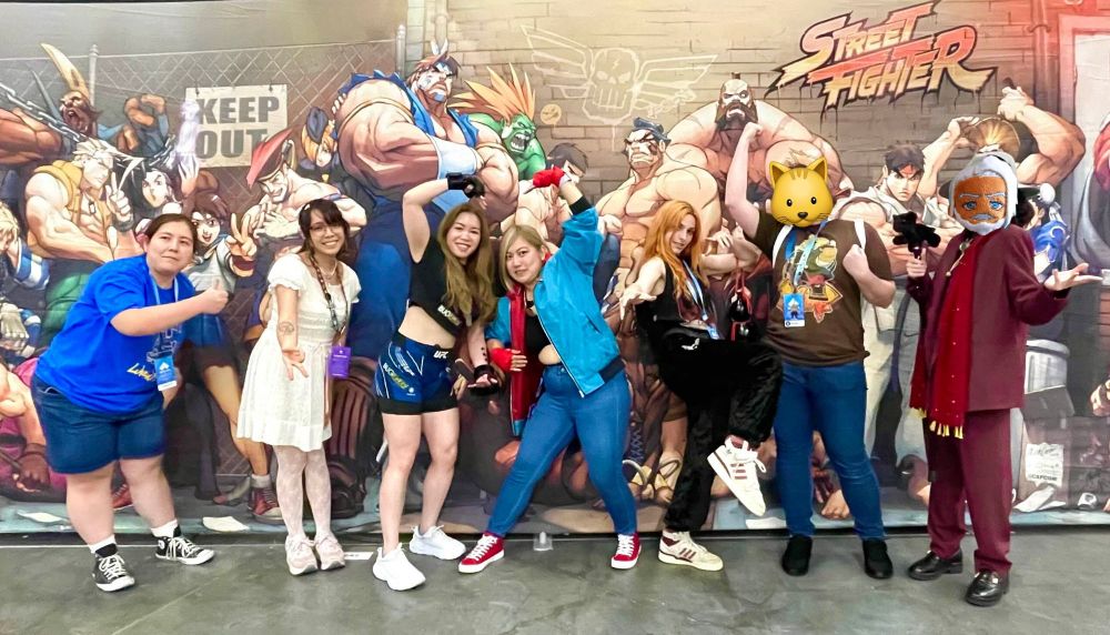 Friend group picture taken at the Udon Street Fighter mural
