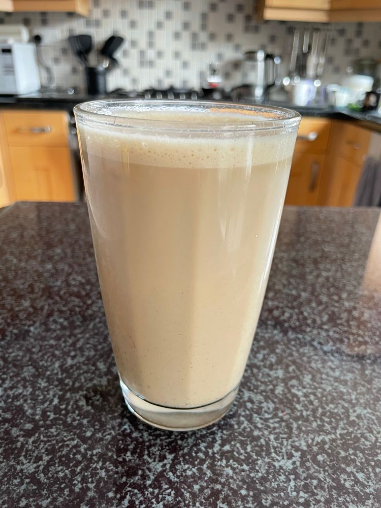 An Iced coffee. Sitting in a glass on my kitchen countertop