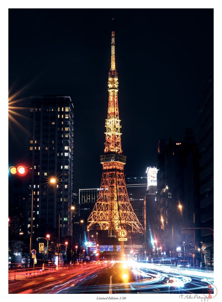 Tokyo Tower filling the frame with a 4 lane road leading up to it. Traffic is streams of blue and red lights due to the long exposure technique used for this medium format print. There are buildings on each side of the street and a center divider which is where the camera was placed. There is a subtle pleasing blooming effect due to small drops of rain on the camera lens. Limited Edition prints on high quality archival paper are available at https://www.filmstudiojapan.com