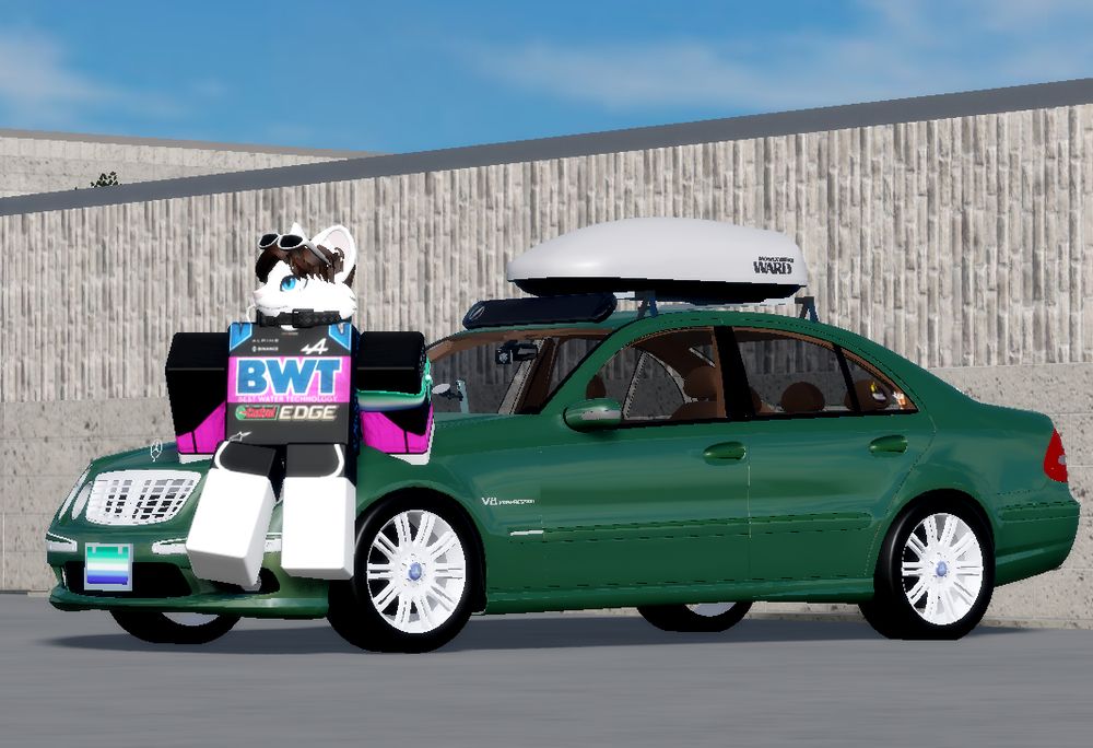 ROBLOX Mink character sitting on top of a 2006 Mercedes-Benz E55 AMG Supercharged V8 Sedan