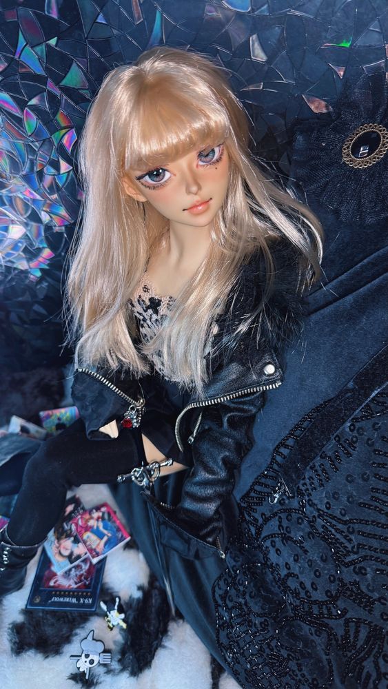 girl bjd in leather and leopard print, she’s a luts delf harang doll 