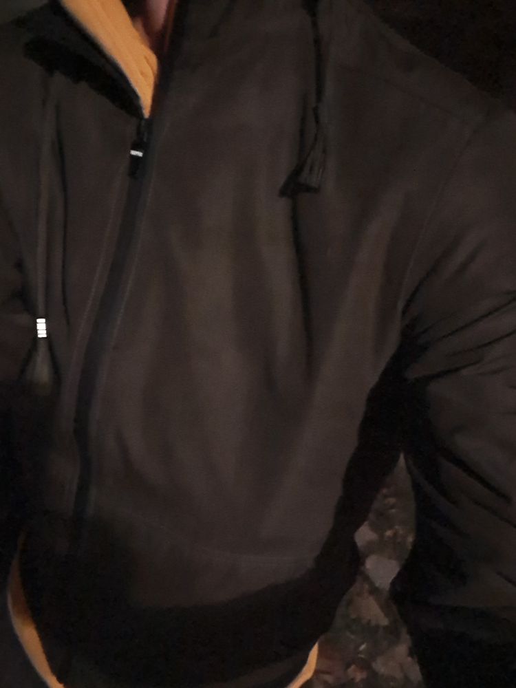 Me wearing a dark green hoodie-jacket with a yellow hoodie sweat underneath