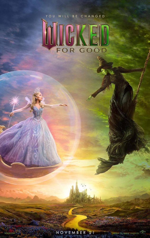 The Wicked: for good poster features Ariana and Cynthia in character facing each other floating over Oz and the yellow brick road. 