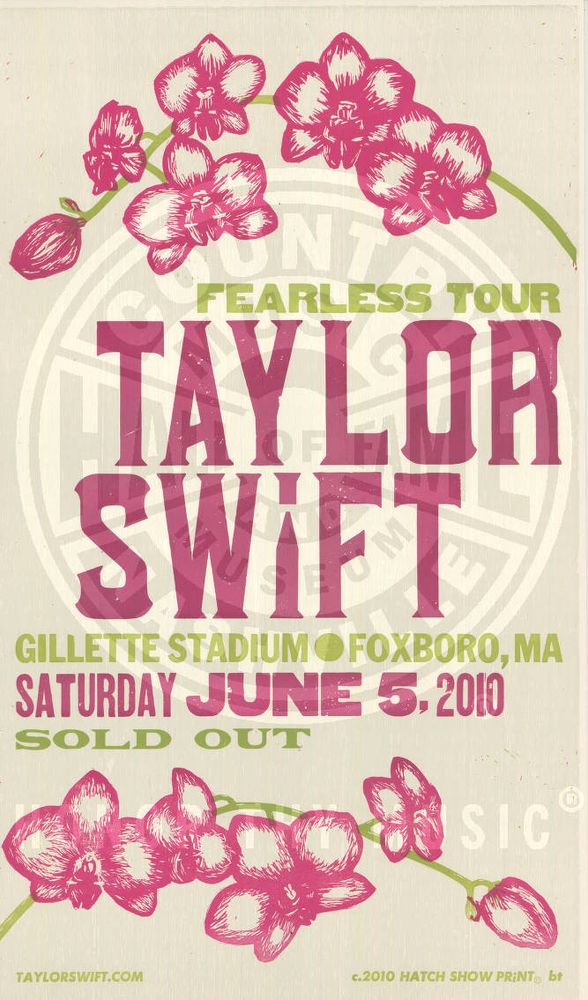 A Taylor Swift advertisement for the fearless tour Gillette Stadium show on Saturday, June 15, 2010 sold out with graphic images of pink orchids and green text. 