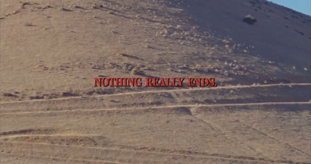Nothing really ends in red text over a desert. 
