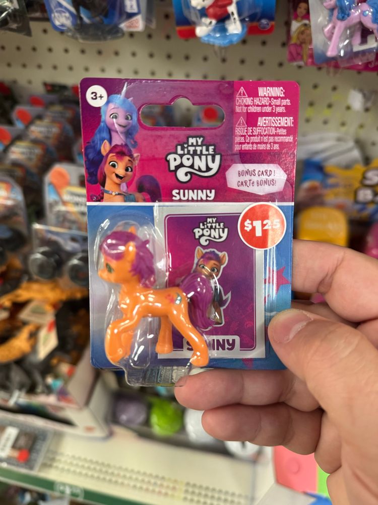 A My Little Pony “Sunny” toy with the red sticker removed, showing the original price of $1.25.