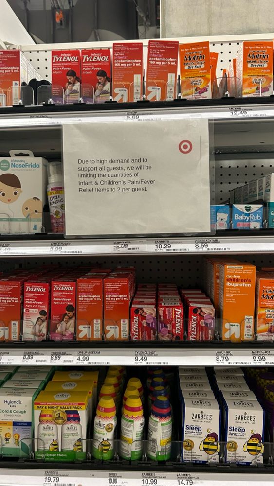 Children’s fever section at target. A sign has been placed stating “due to high demand and to support all guests we will be limiting the quantities of infant and children’s pain and fever relief items to 2 per guest”