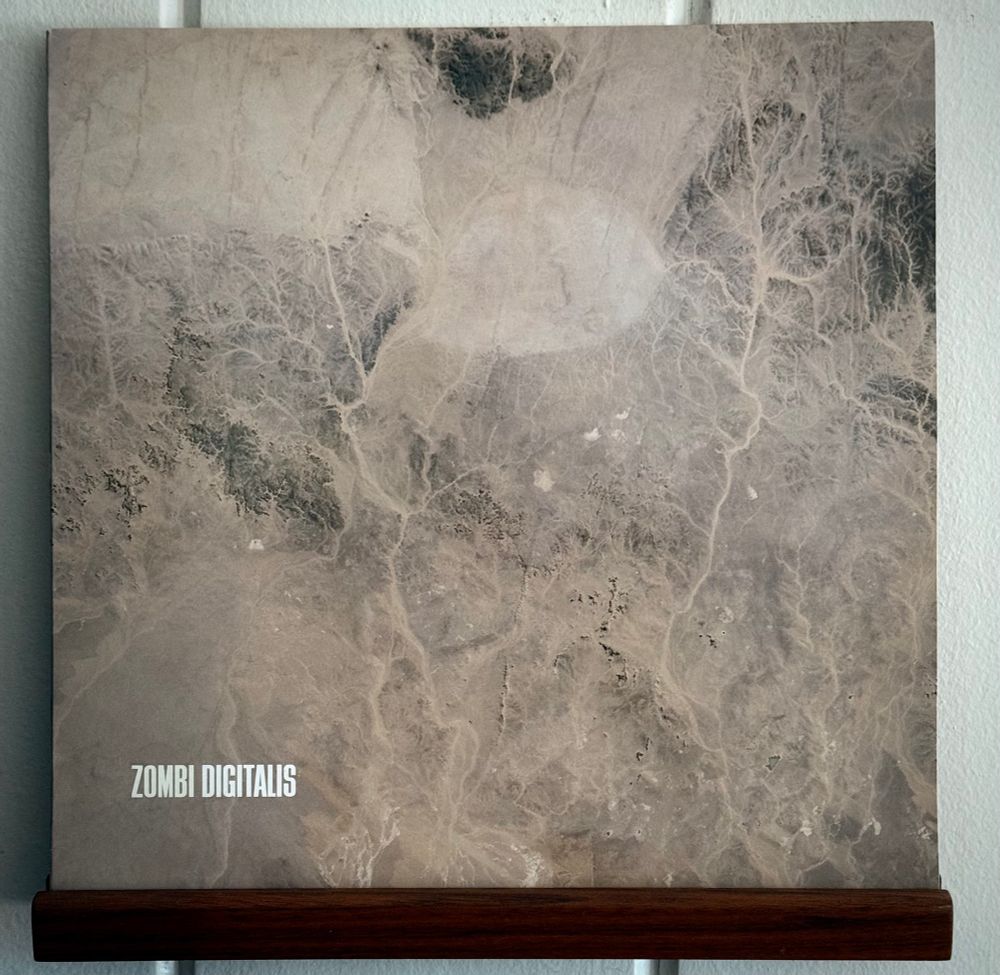 Front cover of Zombi Digitalis LP - an aerial shot of a barren landscape

