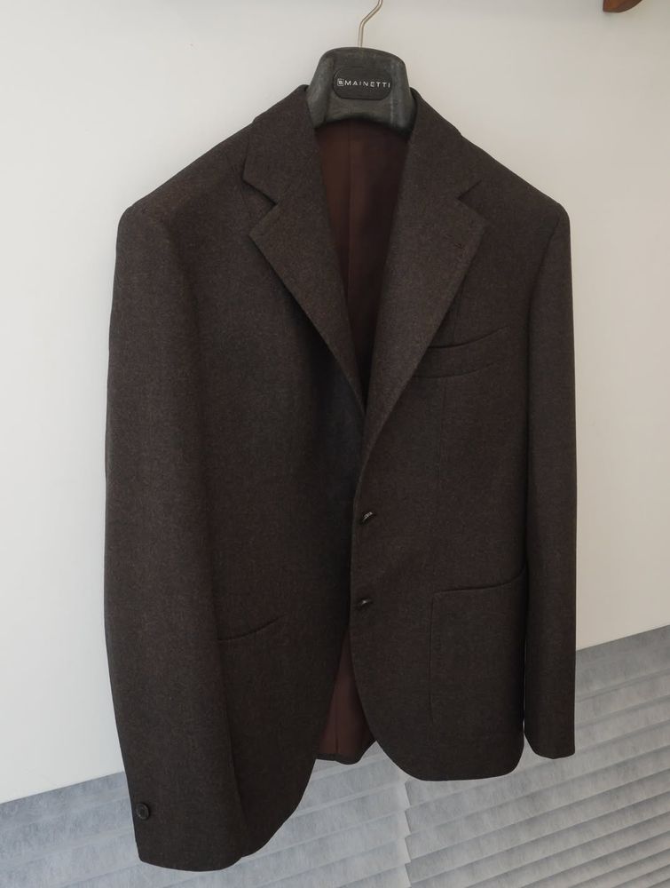 A brown sport coat. 