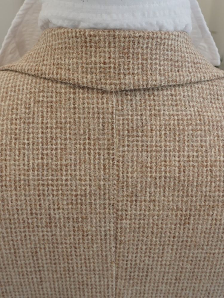 The back of the jacket. The pattern matching across the collar and back. 