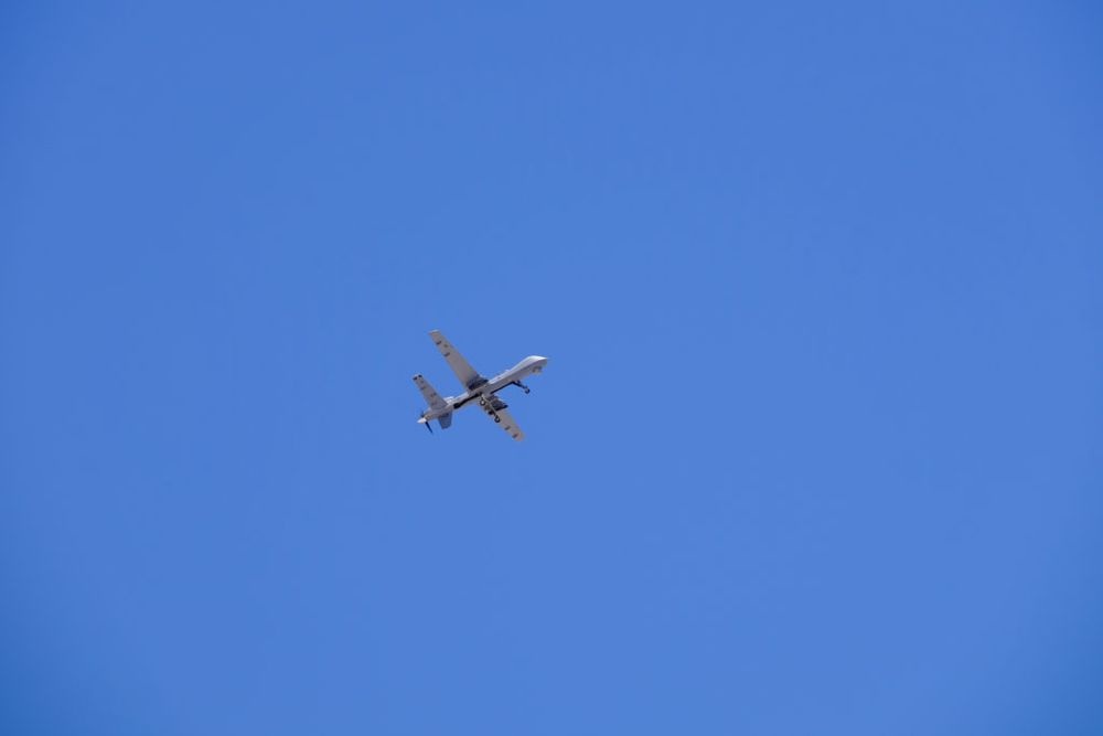 A military drone in the sky. I'm prob going to die now. 