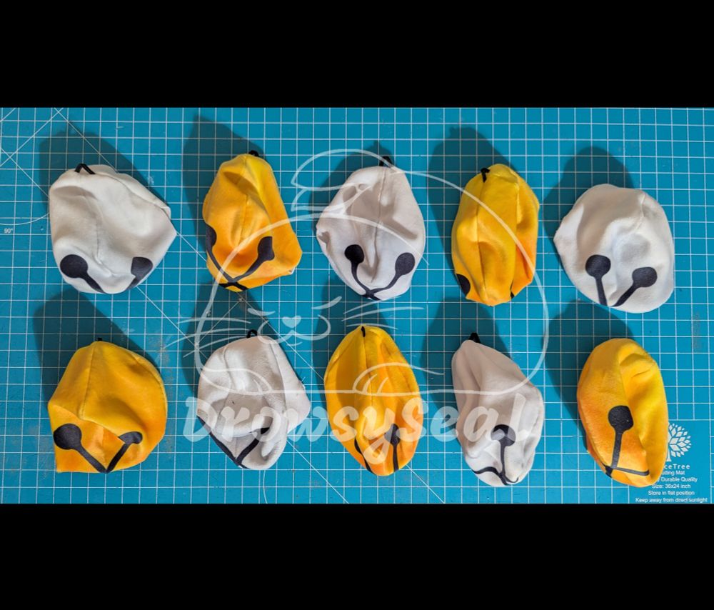Unstuffed gold and silver bell plushies