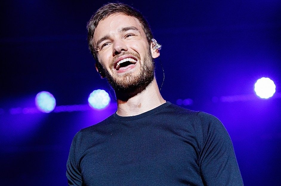 Liam Payne smiling on stage 