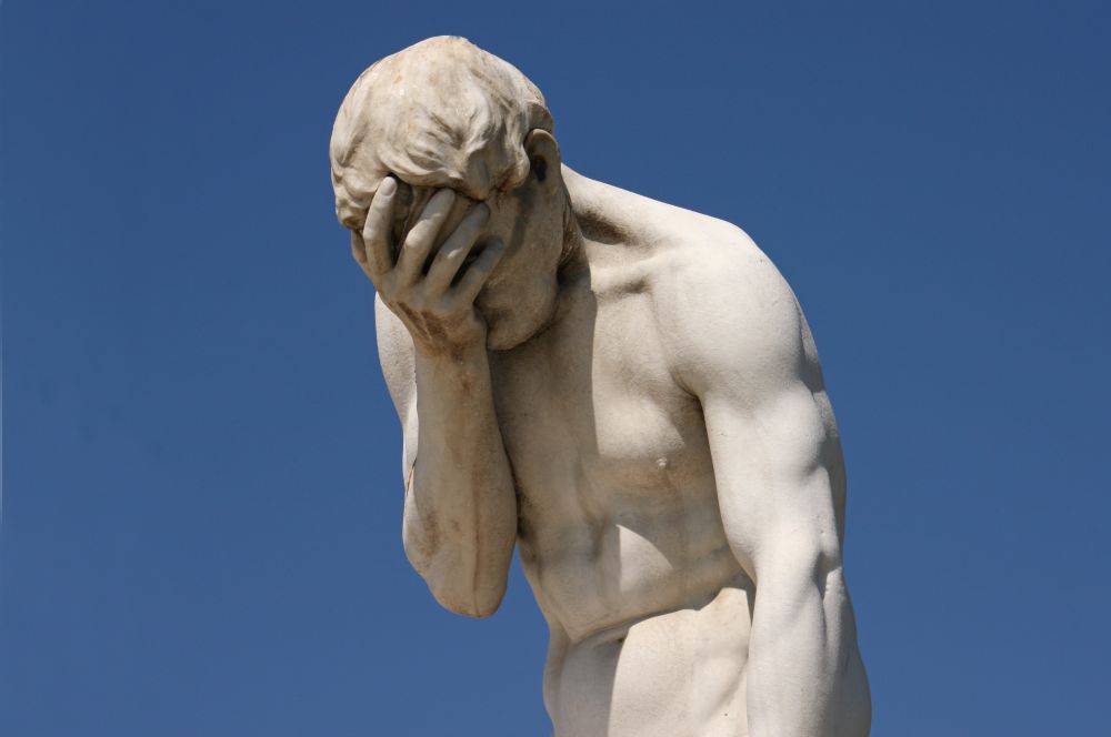 Image from Shutterstock. It’s not a classical statue of a “facepalm,” but it certainly looks that way. It’s actually a depiction of “Cain After Killing His Brother Abel,” by Henri Vidal, found in the Tuileries Garden in Paris.