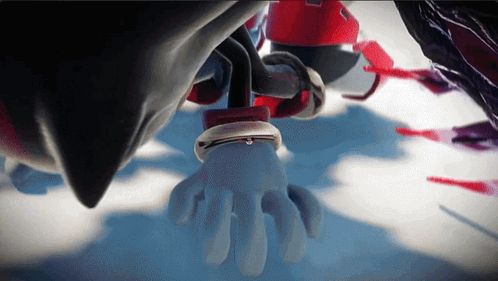 a close up of a shadow the hedgehog 's hand with a red ring