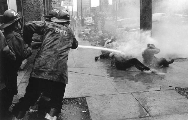Police order fire fighters to turn hoses on civil rights protesters, 1963