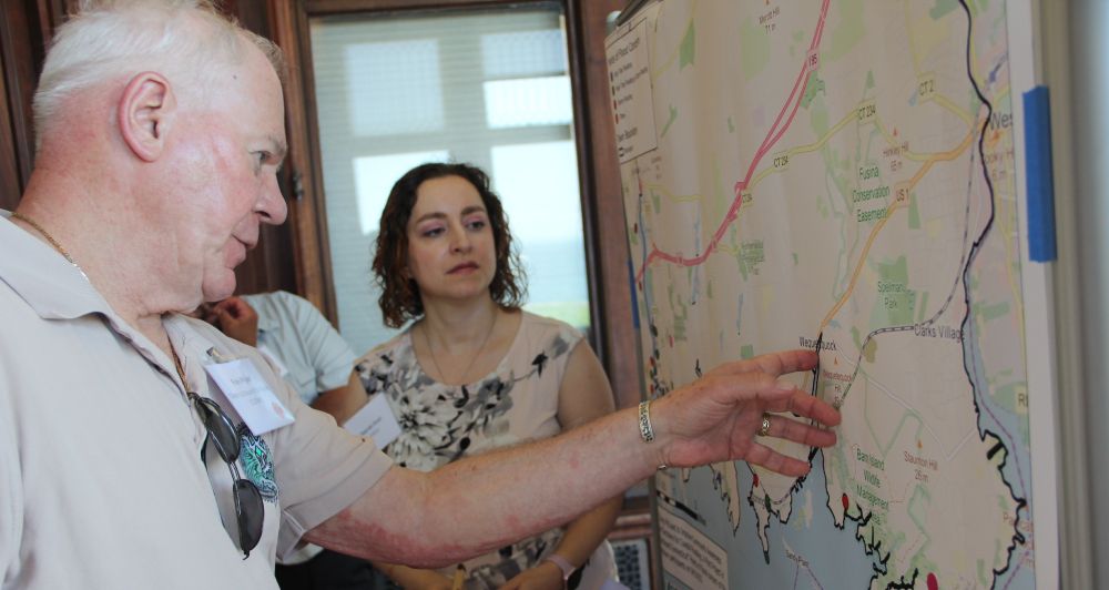 Fran Pijar of Clean Up Sound and Harbors points out an area of Stonington prone to flooding during a workshop for the MyCoast pilot project.