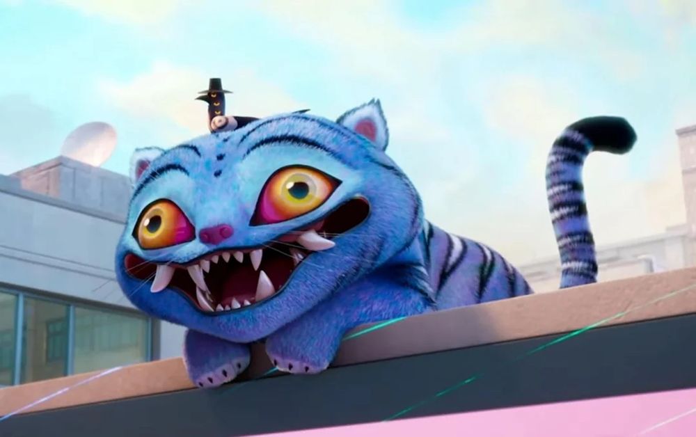 A still from the Netflix film “K-pop Demon Hunters” with the animal character Derpy (blue tiger) and Sussie (magpie with three eyes and a tiny hat)