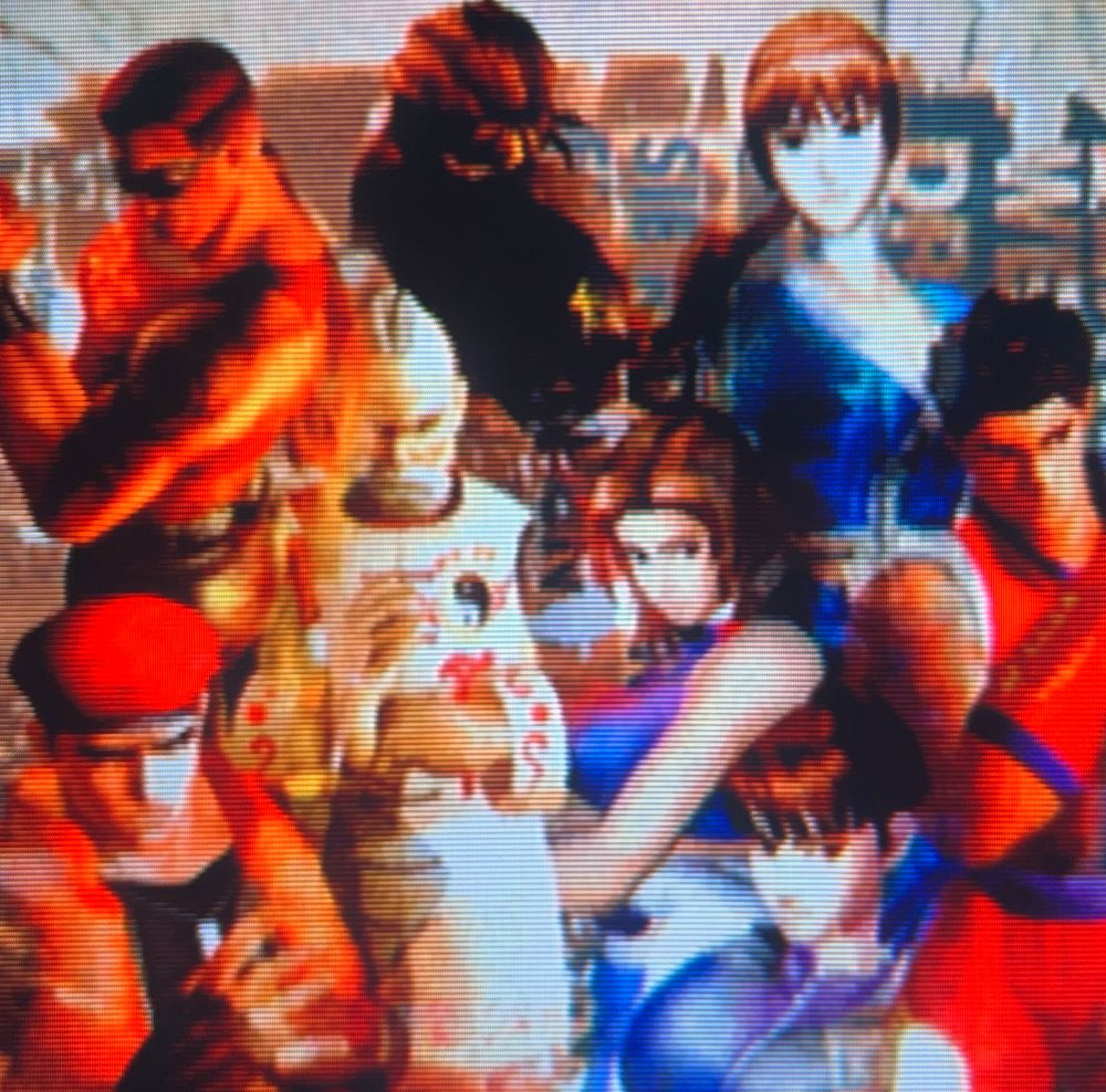 all of the original characters from the arcade game pose together on the loading screen // Dead or Alive Ultimate for Xbox, photography on CRT TV 