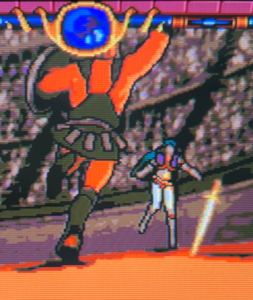 The beginning of the fight shows the sword highlighted, the player must tap right to pick it up 