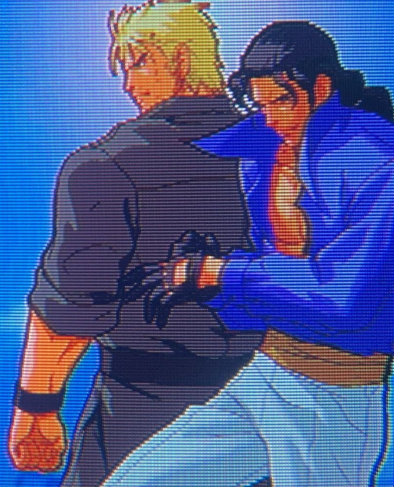 Ryo Sakazaki as Mr. Karate 2 from Buriki One stands with his back facing international playboy Robert Garcia, his fellow disciple of Kyokugenryu and long time friend // Neo Geo Battle Colosseum for Playstation 2, photography on CRT TV 
