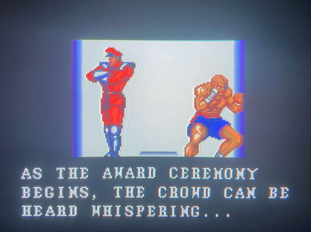 M. Bison and Sagat stand at the award ceremony waiting for Ryu to enter // Street Fighter 2 Special Champion Edition for Sega Genesis, photography on CRT TV 