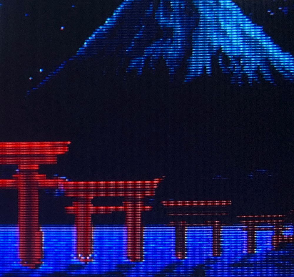 Torii gates line the way towards a distant mountain just off the coast of the shoreline. The darkness of the far away rock blends in with the night sky dotted with stars // Samurai Shodown 2 for Neo Geo AES, photography on CRT TV 