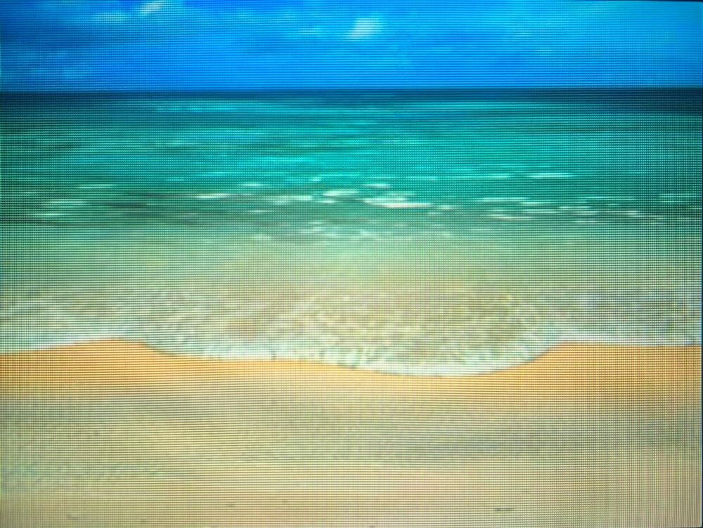 the foamy sea water lurches up the beach and onto the shore, before reversing back into the pale green and blue depths // Final Fantasy 8 for PlayStation, photography on CRT TV 