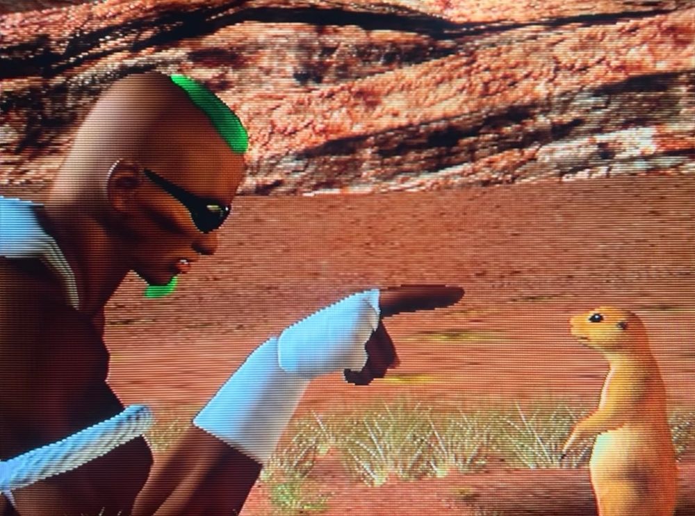 Zack points towards a new friend he made, DOA2 Hardcore, shot on Sony CRT 