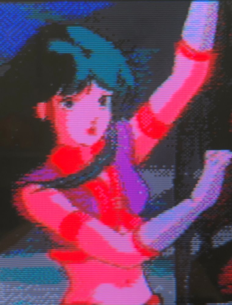 Reika hangs on tightly during the action