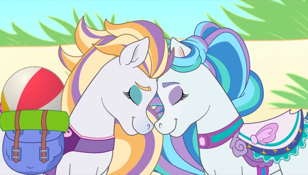 Screenshot from Wild Manes. Perla and Finley are touching foreheads sweetly.