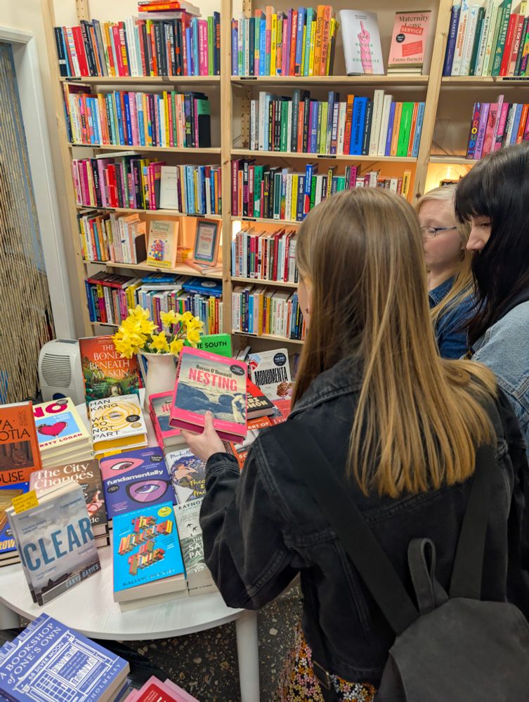 Checking out the books at Juno