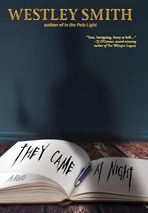 Book cover: Open guestbook on a table with the words 'They Came at Night' inked across and a pen sat in the centre margin. Author name at the top.