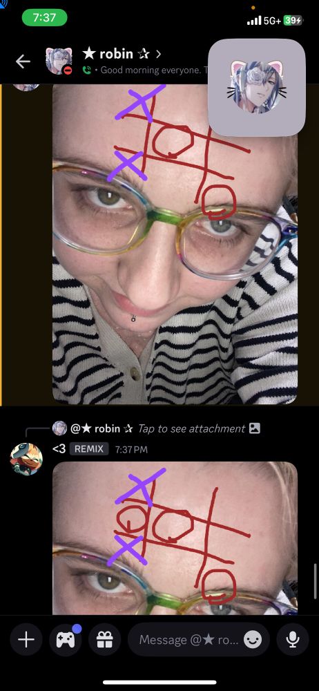 A photo of a discord chat. The first message seen has a photo of a person with heterochromatic eyes and pale glasses on their facd. There is a piercing just below their lip, and they are wearing a black and white striped top. They are looking up at the camera, with their forehead full visible. Upon it, there are red marks in the pattern of a hash, and there is a circle in the middle and in the bottom right. There are x's in the top left and bottom left. In the second message, the same photo is seen with a circle added to the middle left. 
